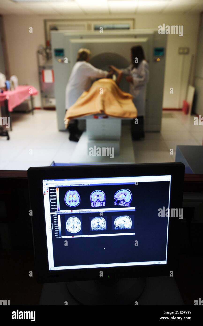 Patient undergoing Positrons Emission Tomography scan (PET scan) of the brain. Stock Photo