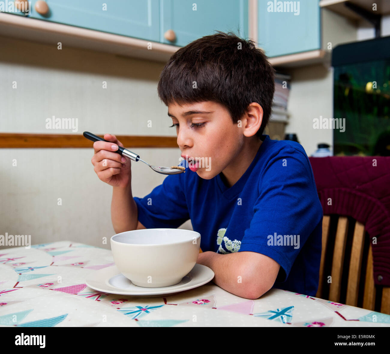 boy eating cereal Stock Photo