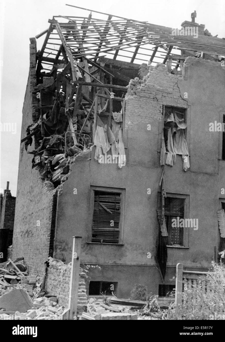 The picture from a Nazi news report shows a destroyed residential building after a British aerial bomb attack in a outer neighborhood of Berlin, Germany, September 1940. Photo: Berliner Verlag / Archive - NO WIRE SERVICE Stock Photo