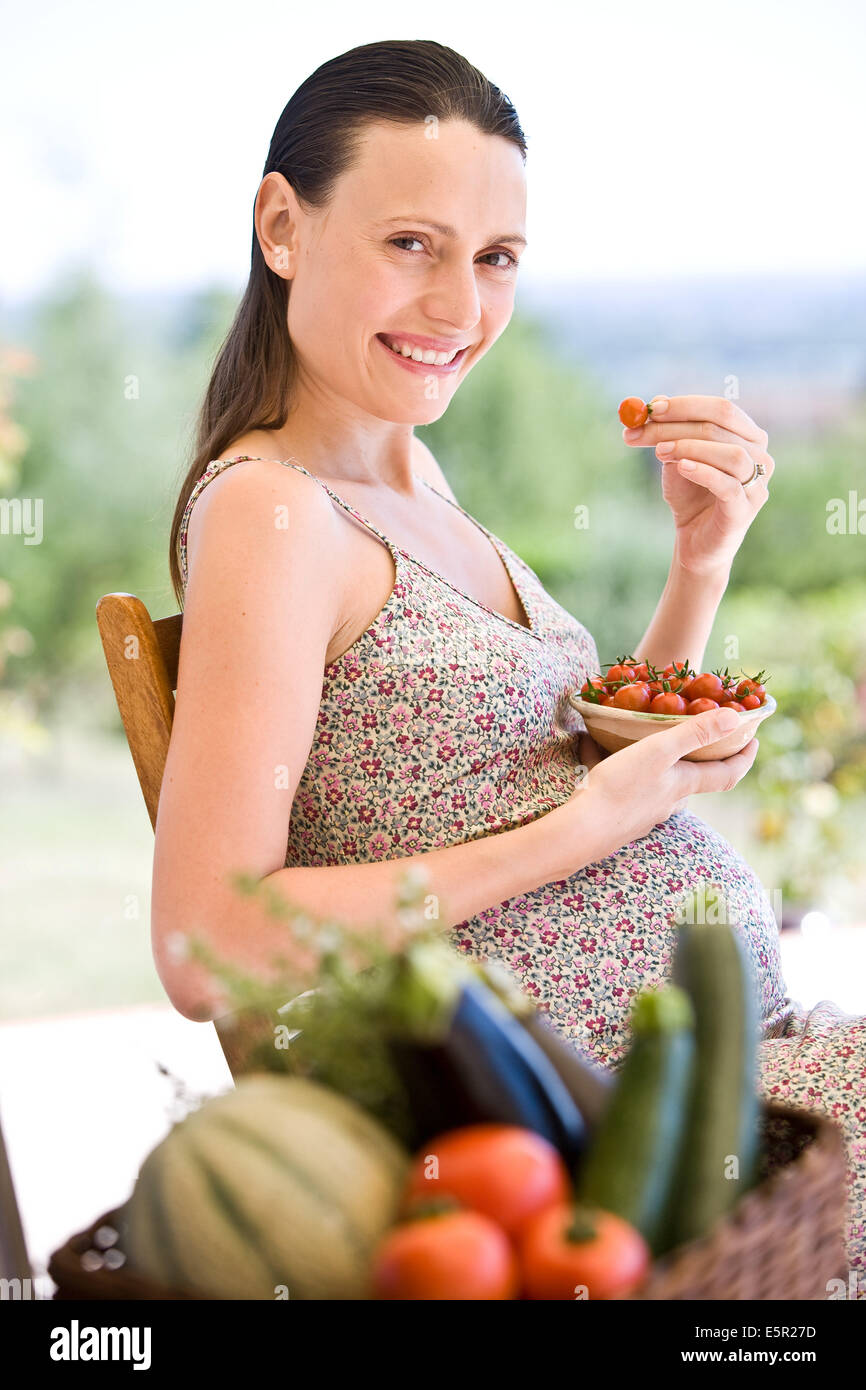 Pregnant woman with fresh vegetables Stock Photo - Alamy