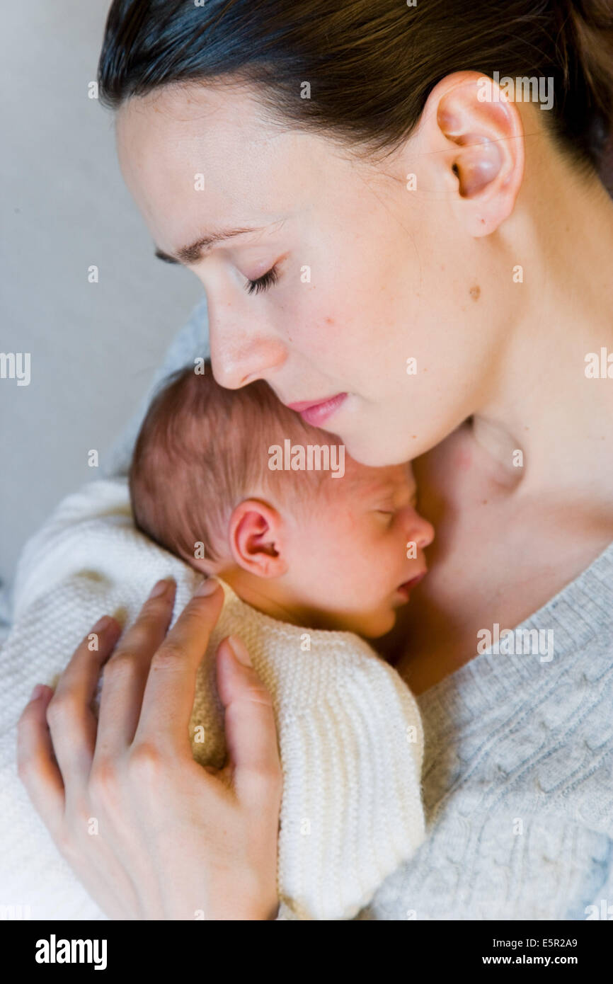 3 week old baby with his mother Stock Photo Alamy