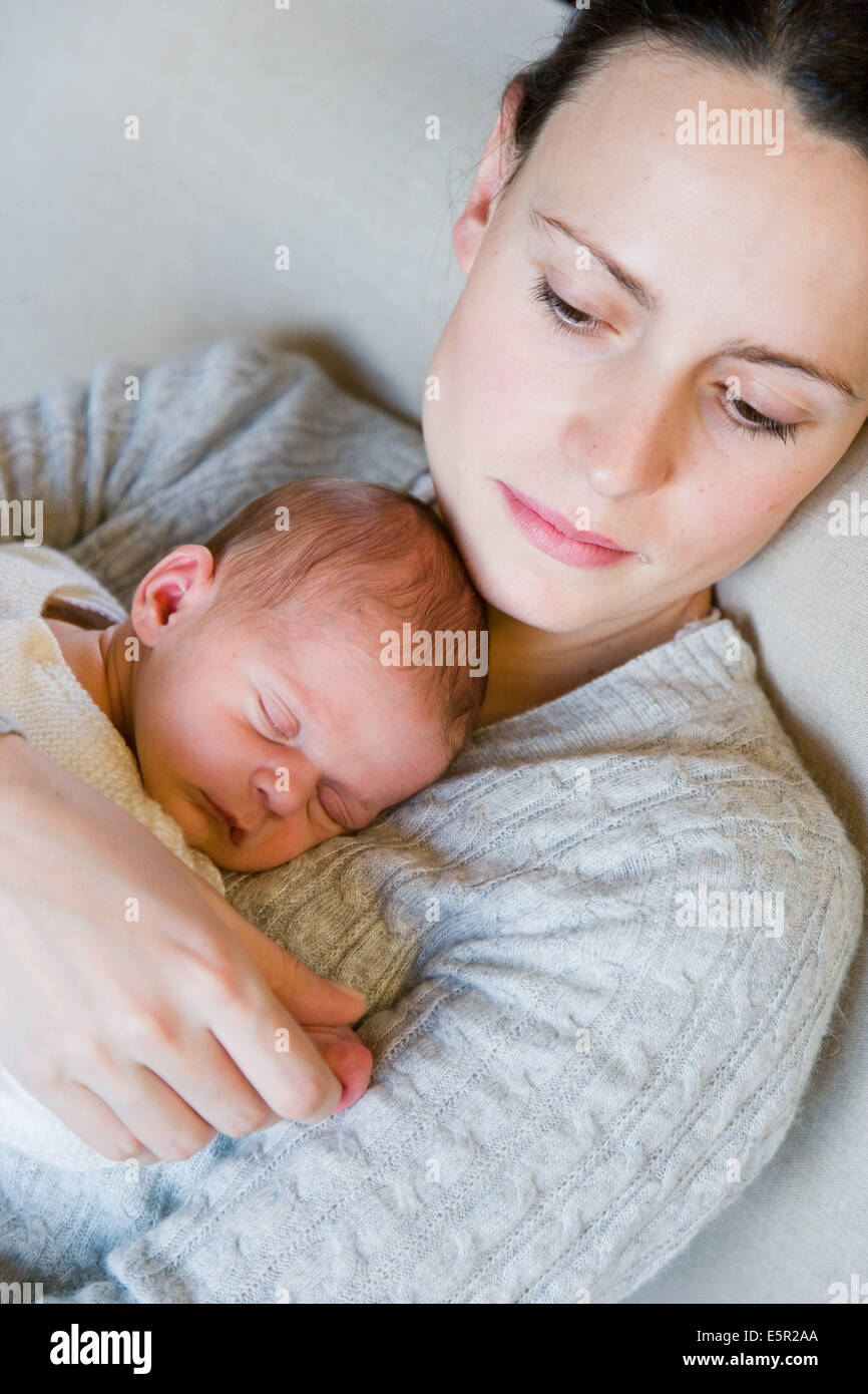 3 week old baby with his mother Stock Photo Alamy