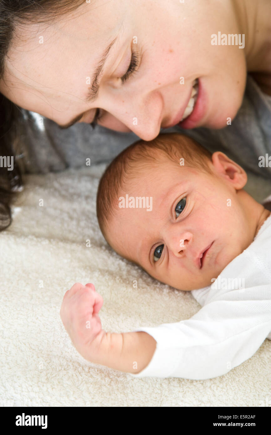 3 week old baby with his mother Stock Photo Alamy