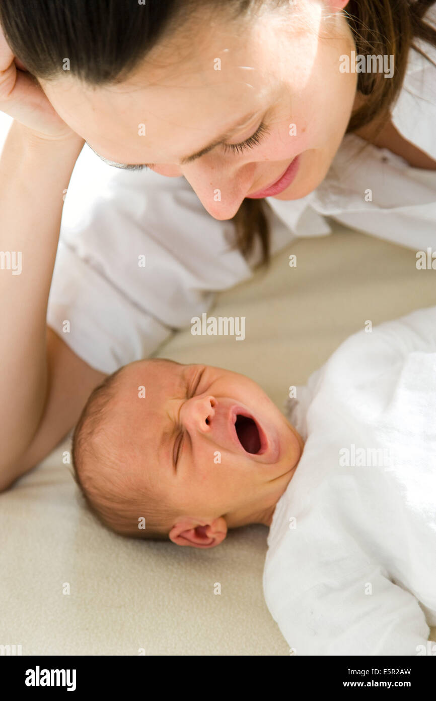 3 week old baby with his mother Stock Photo Alamy