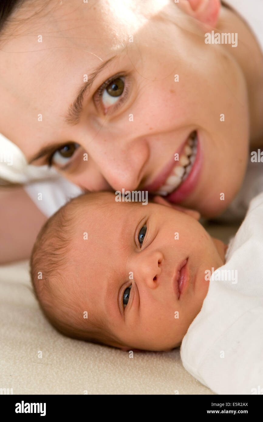 3 week old baby with his mother Stock Photo Alamy
