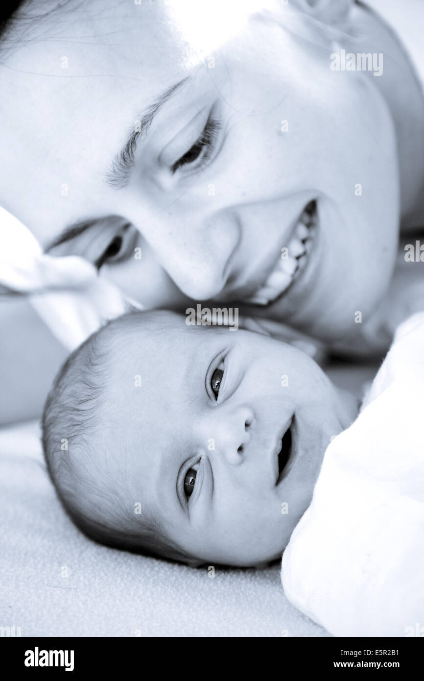 3 week old baby with his mother Stock Photo Alamy