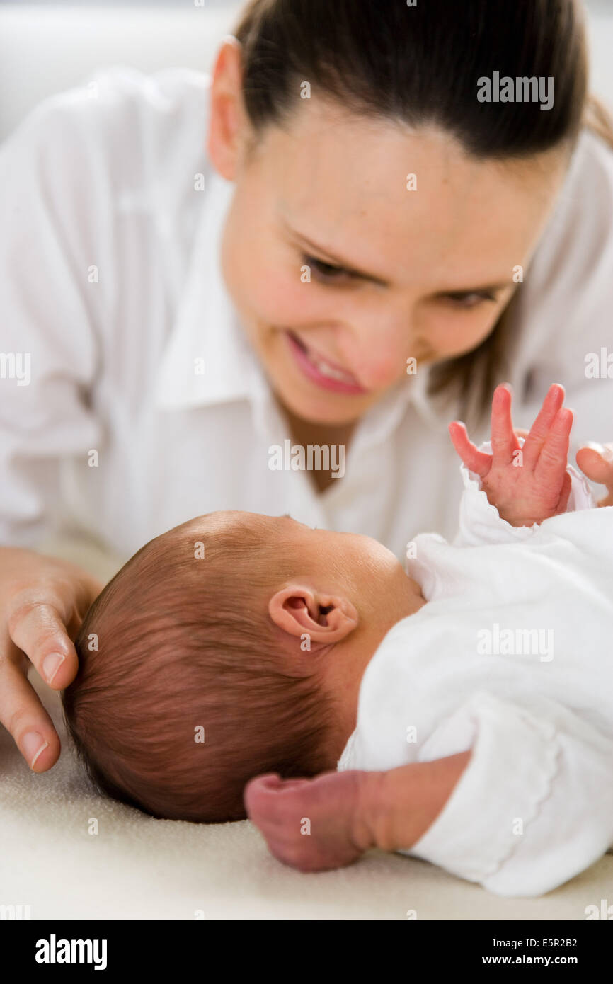 3 week old baby with his mother Stock Photo Alamy
