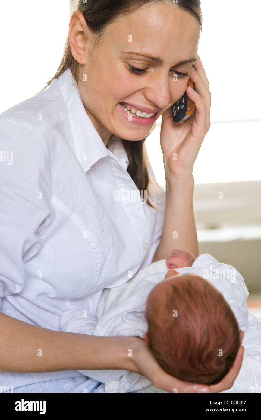 3 week old baby with his mother Stock Photo Alamy
