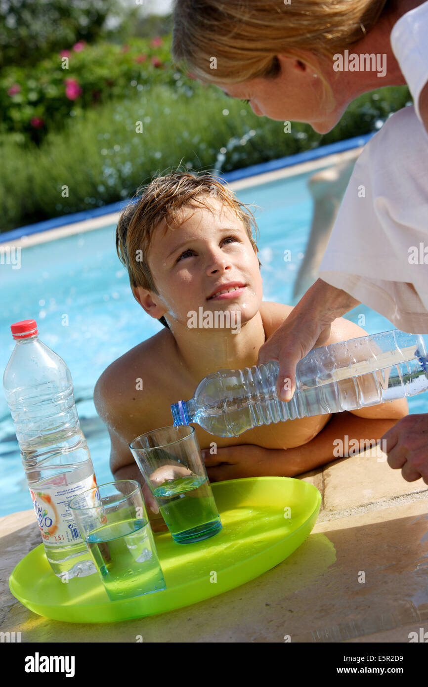 Pool water drinking kid bottle hi-res stock photography and images - Alamy