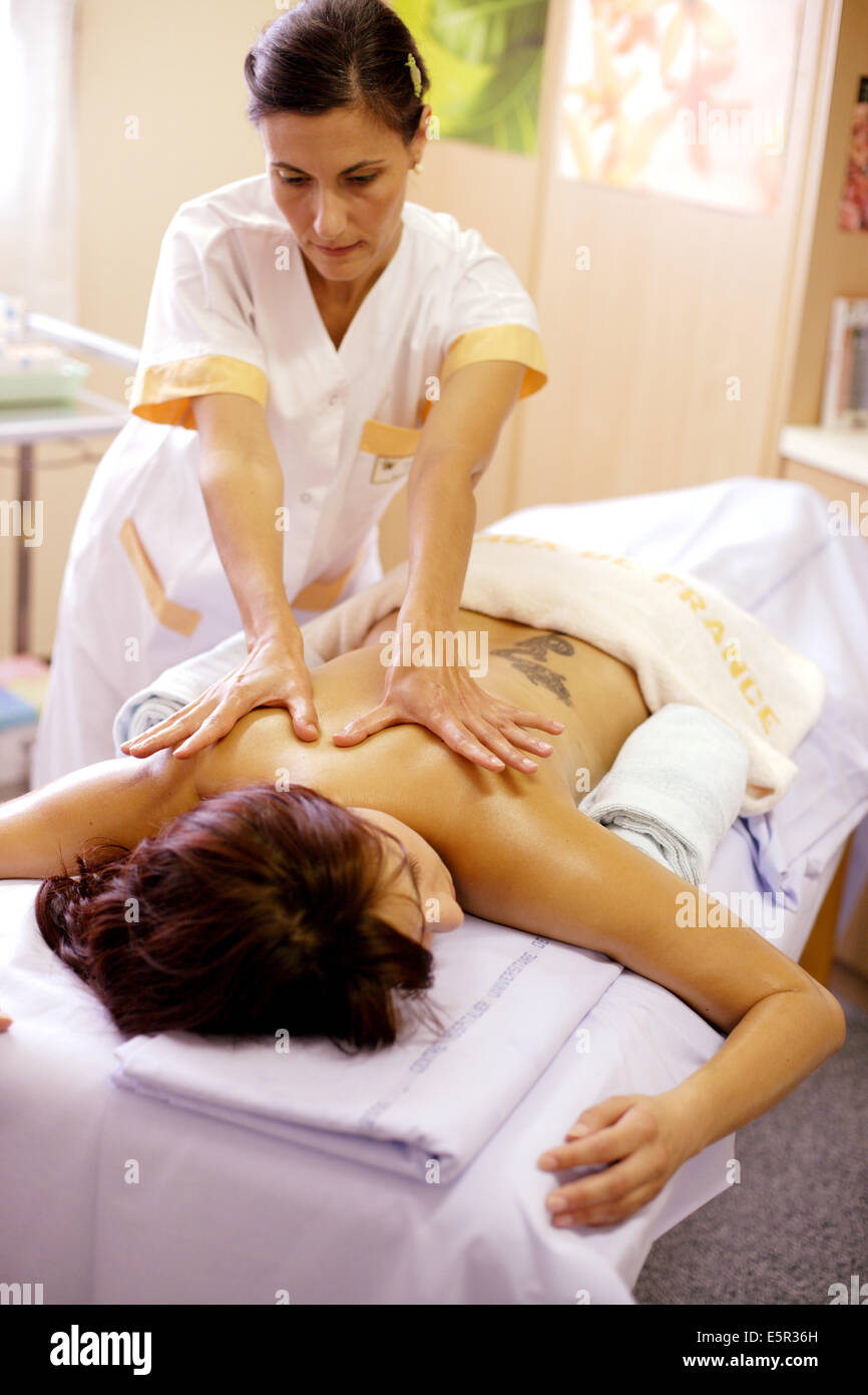 A patient receives hand massages provided by a nurse-sophrologist at the Well being space, Limoges hospital, France. Stock Photo