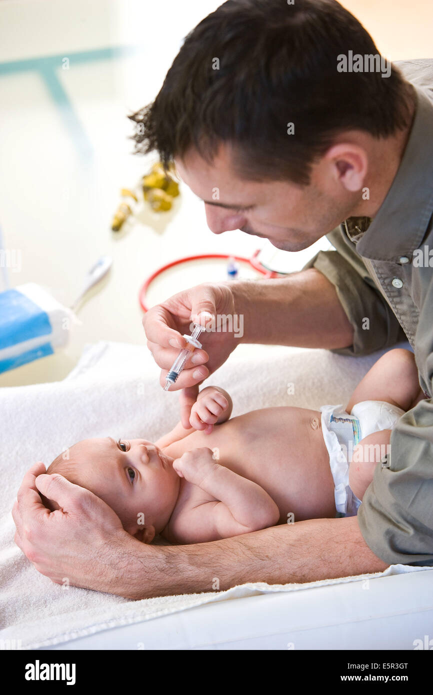 2 month old baby receiving Rotarix vaccination against gastroenteritis ...