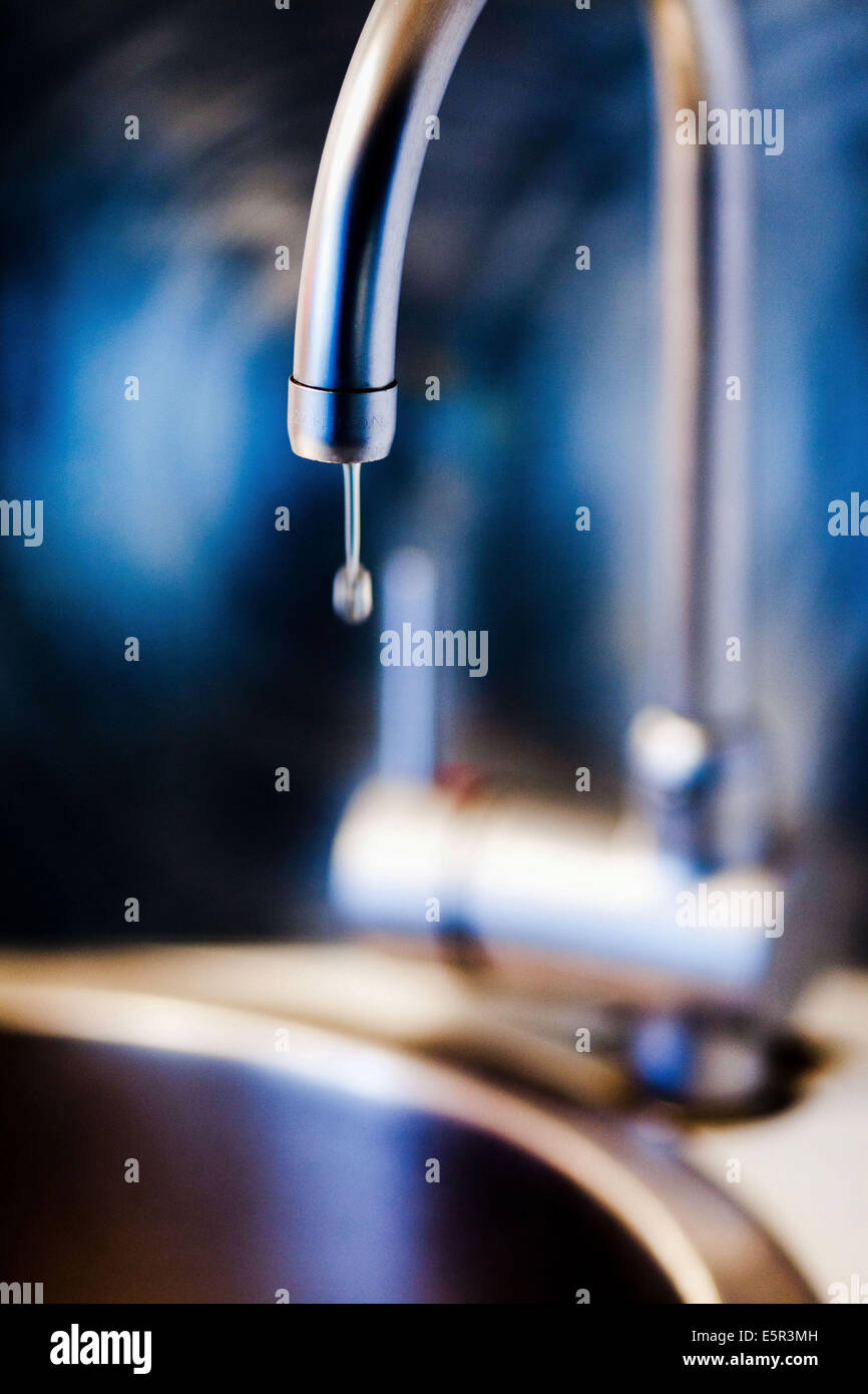 Water dripping from a tap Stock Photo Alamy