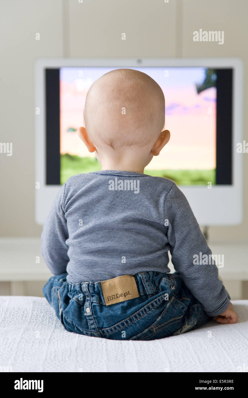 9 month old baby watching television Stock Photo Alamy