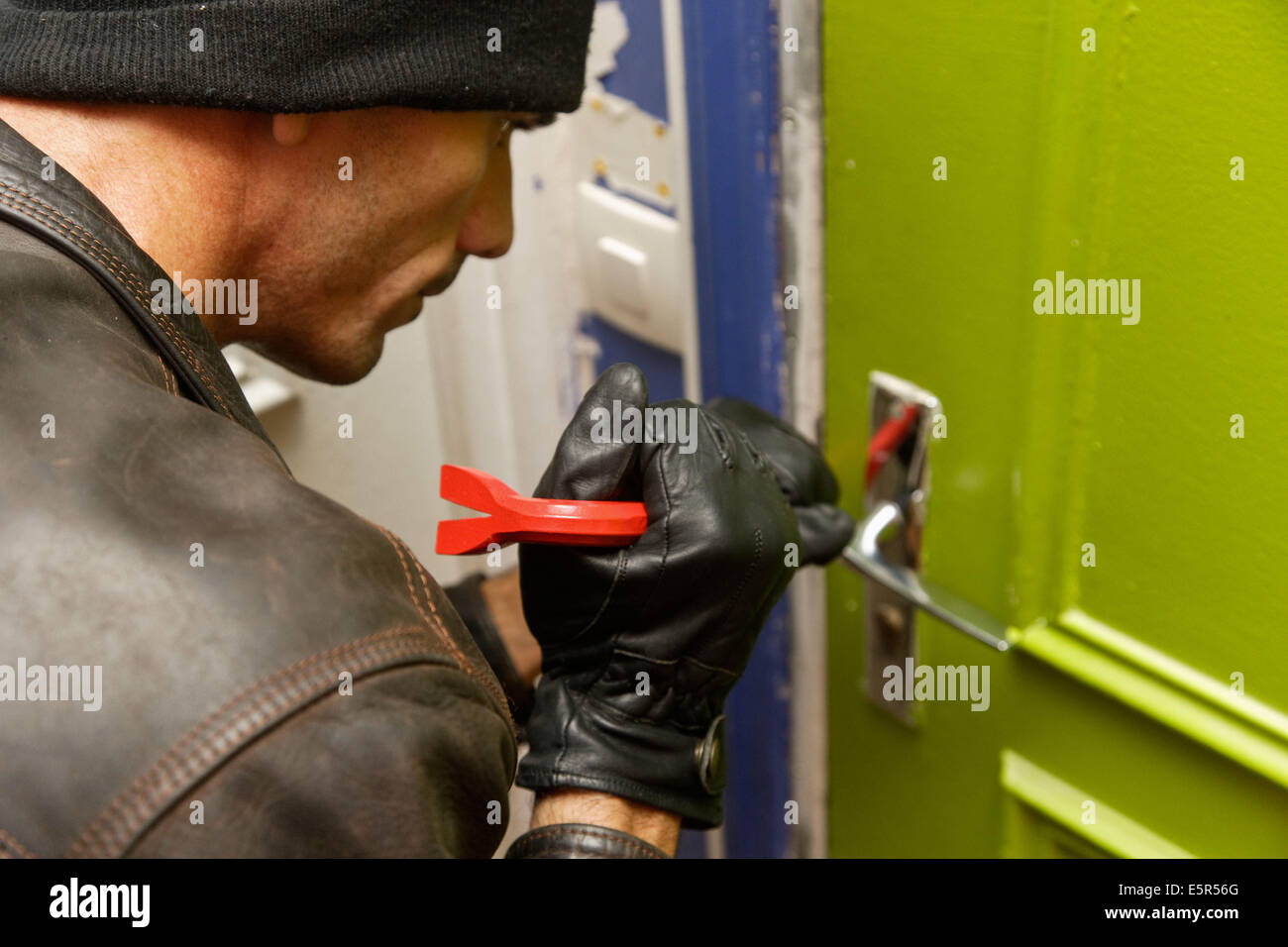 Burglar Trying To Pry Open Door Stock Photo 72423752 Alamy
