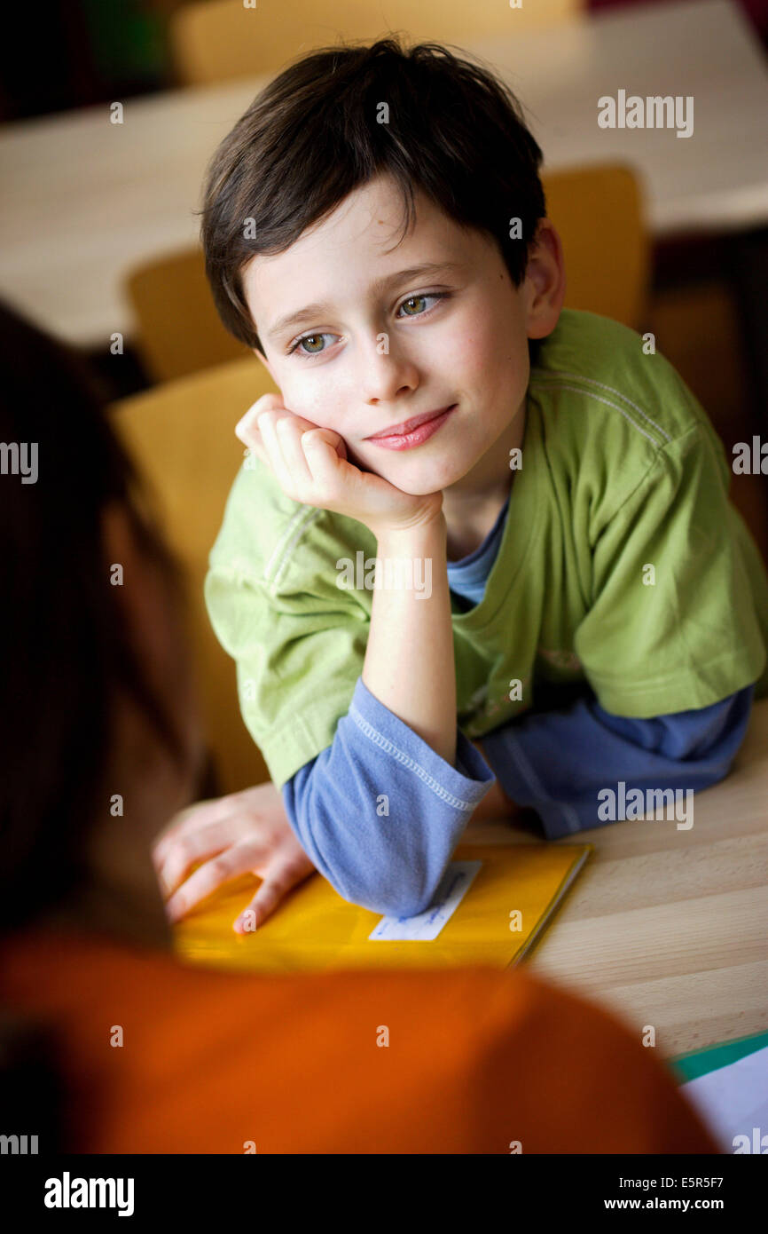Woman talking with a 8 year old boy Stock Photo 72423995