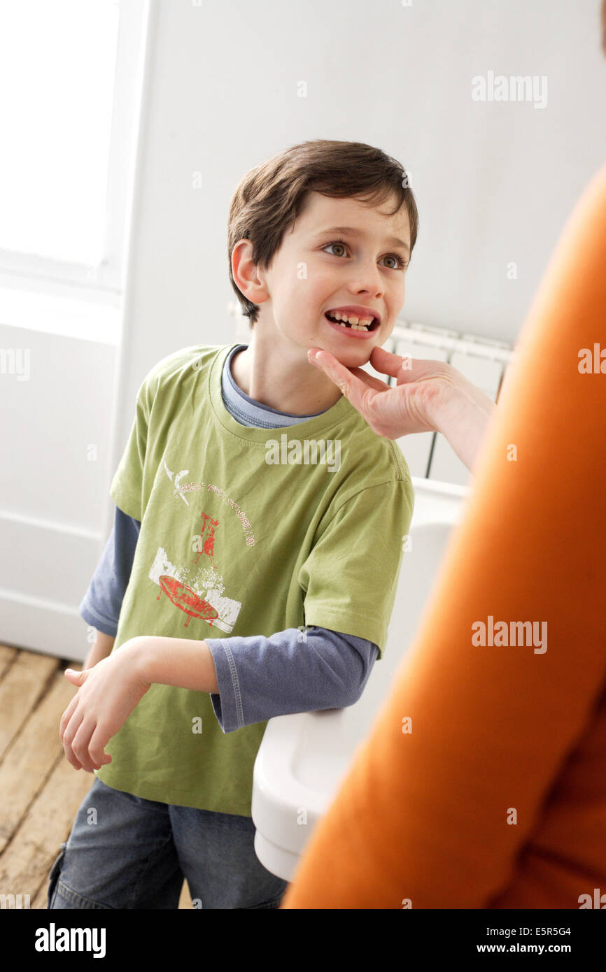 Inspecting teeth after brushing Stock Photo Alamy