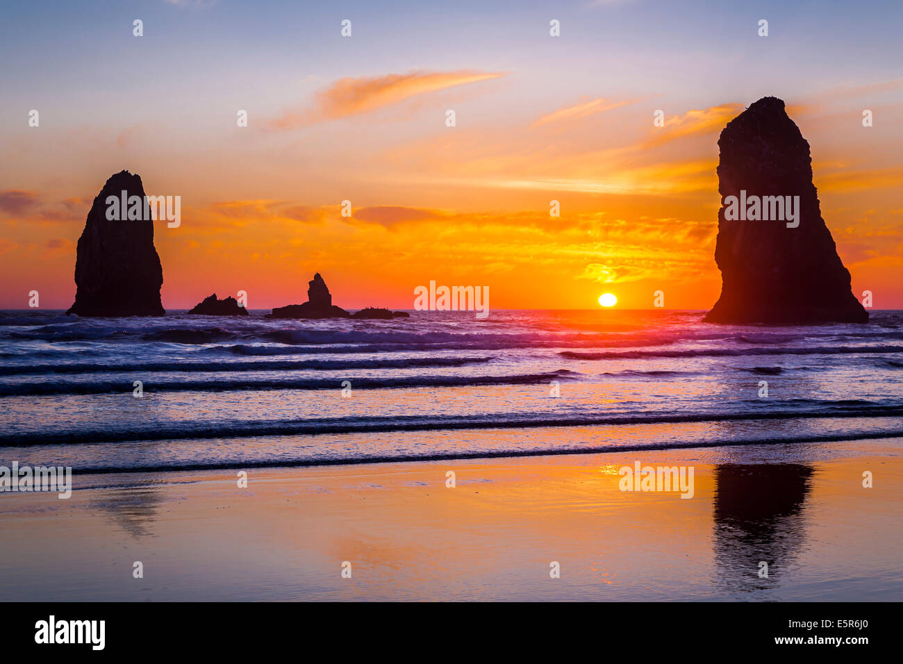 The Canon Beach haystacks at sunset on the Oregon coast, USA Stock