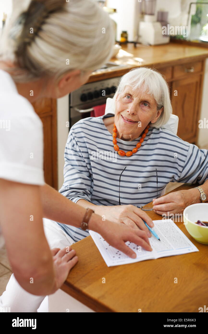 80 Year Old Woman With A Home Care Attendant Stock Photo Alamy