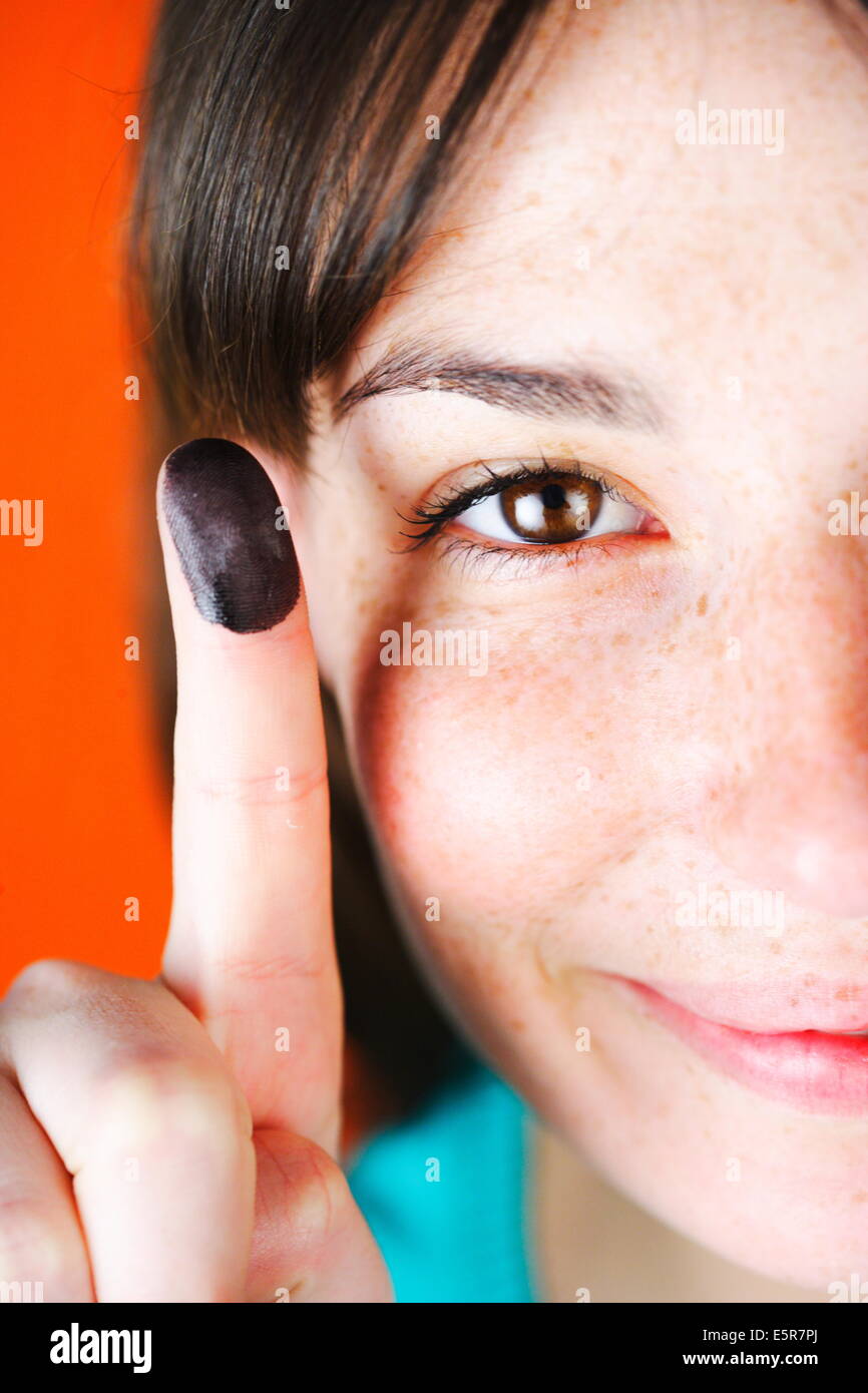 Woman with ink on fingers ( fingerprints ). Stock Photo