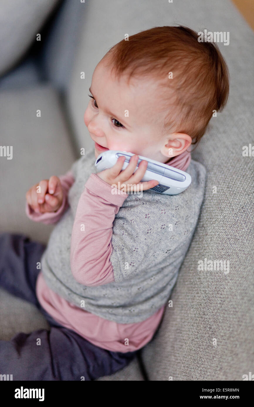 14 Month Old Baby With Cell Phone Stock Photo Alamy