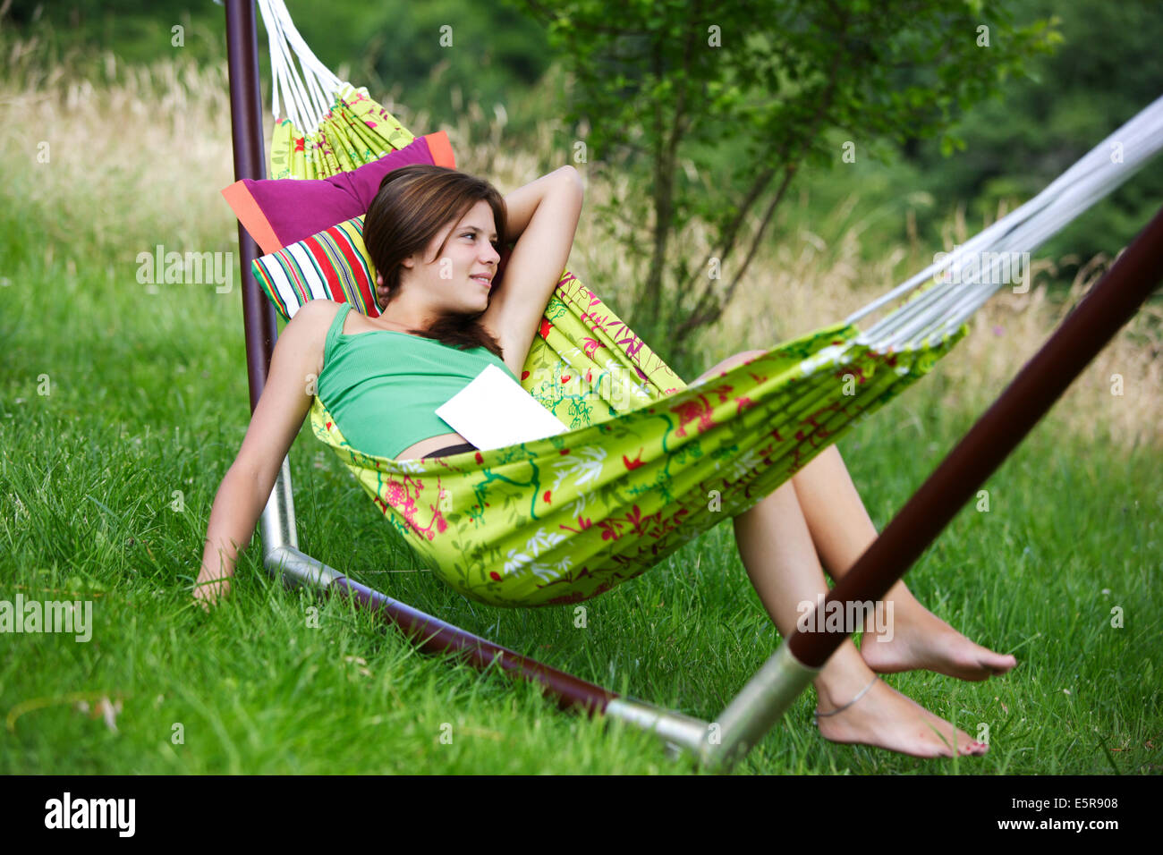 Girl lying in hammock Stock Photo Alamy