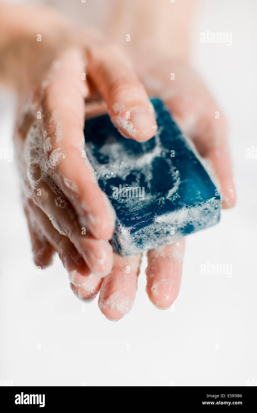 Woman washing hands with bar of soap Stock Photo Alamy