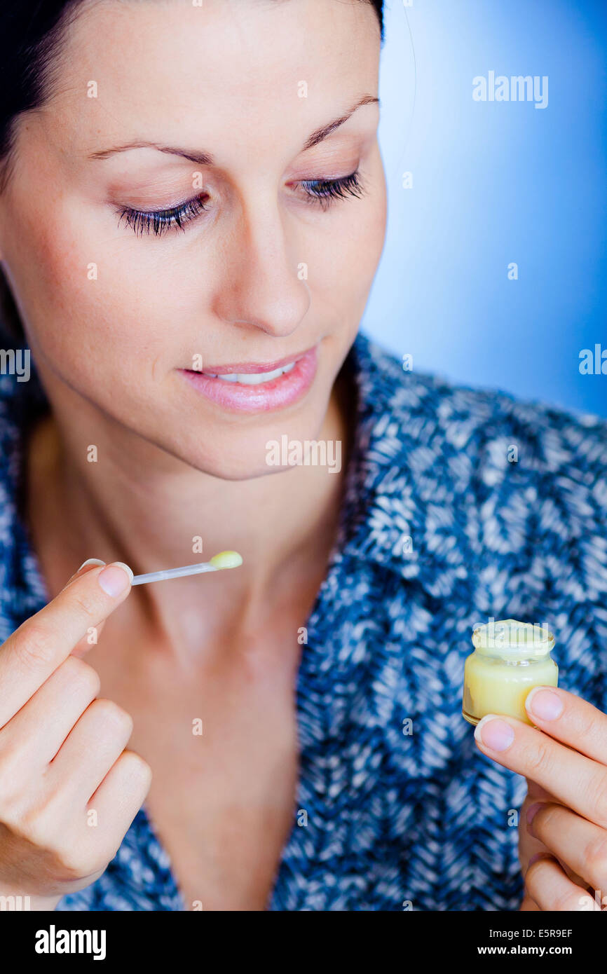 Woman eating royal jelly hires stock photography and images Alamy