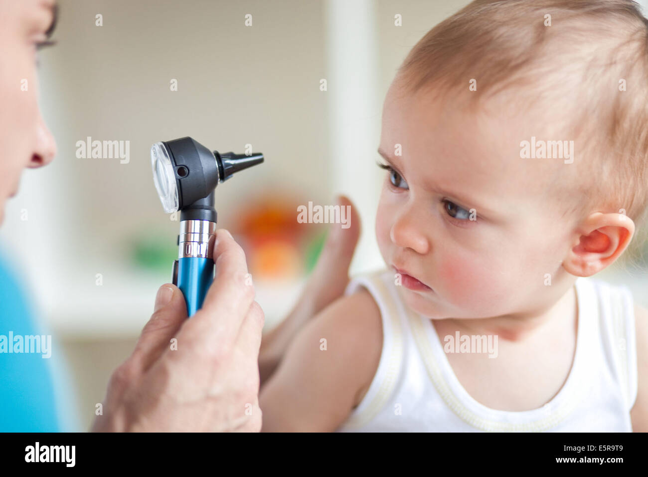 Nose and throat examination otoscope pediatrics pediatrician health