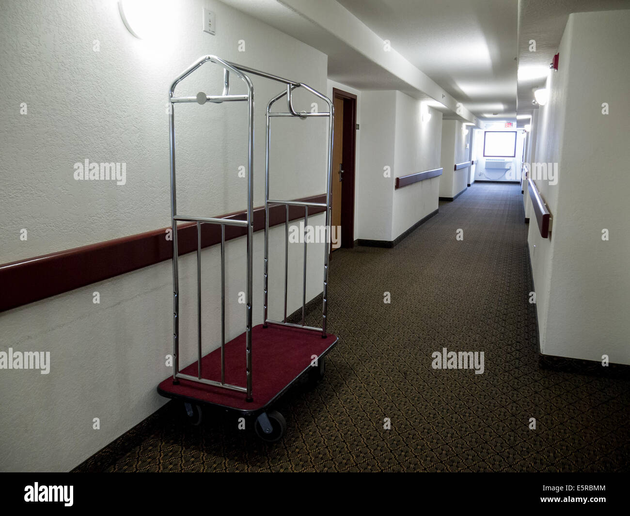 hotel wheeled cart empty hallway Stock Photo