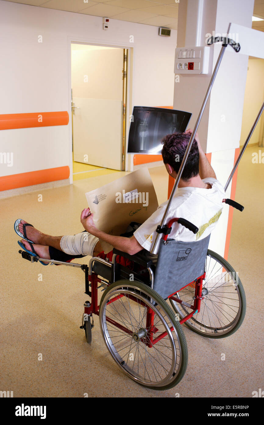 Patient looking at X-ray, Emergency department, Limoges hospital, France. Stock Photo