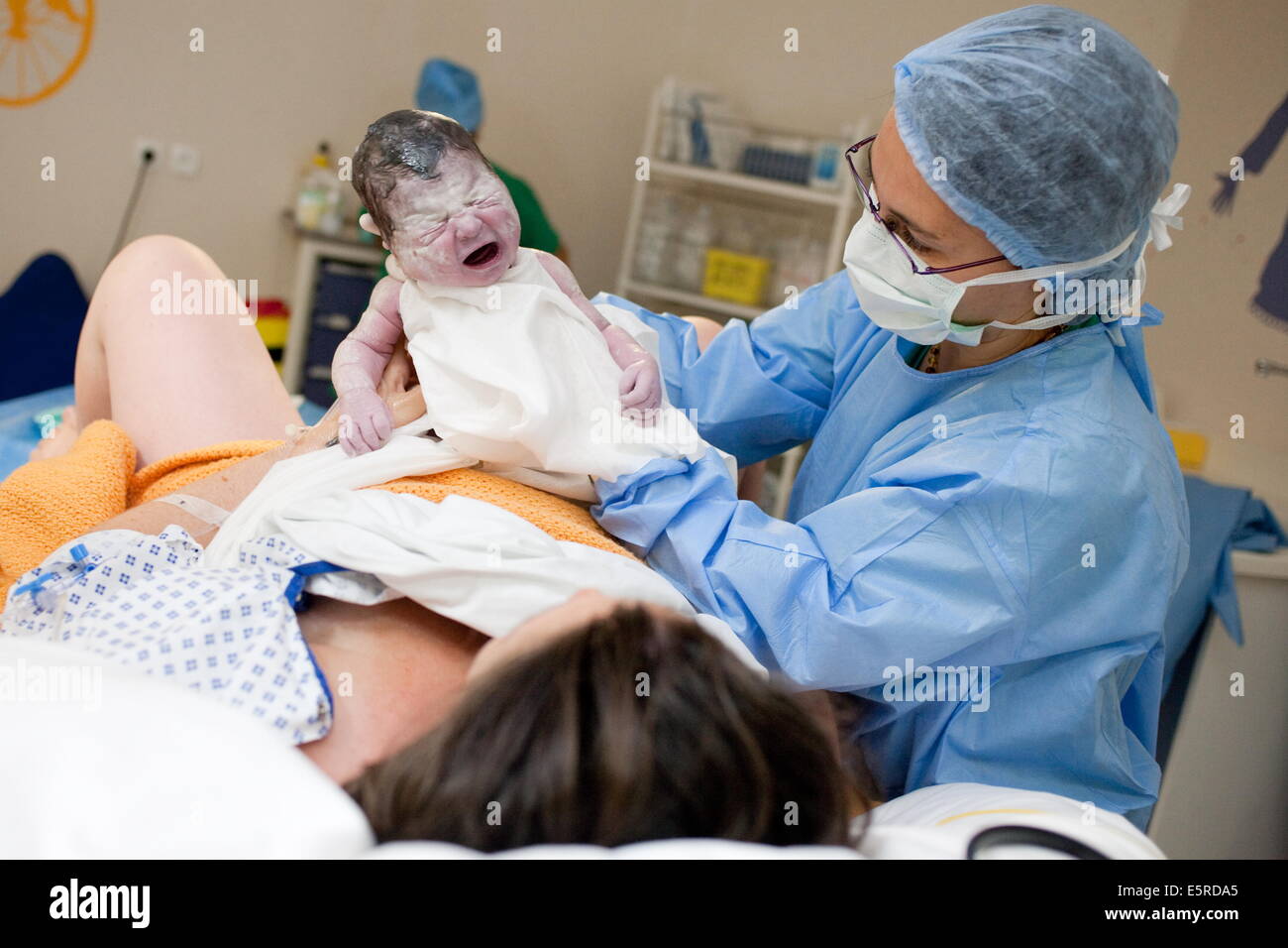 Woman in labor room during delivery, Obstetrics and gynaecology
