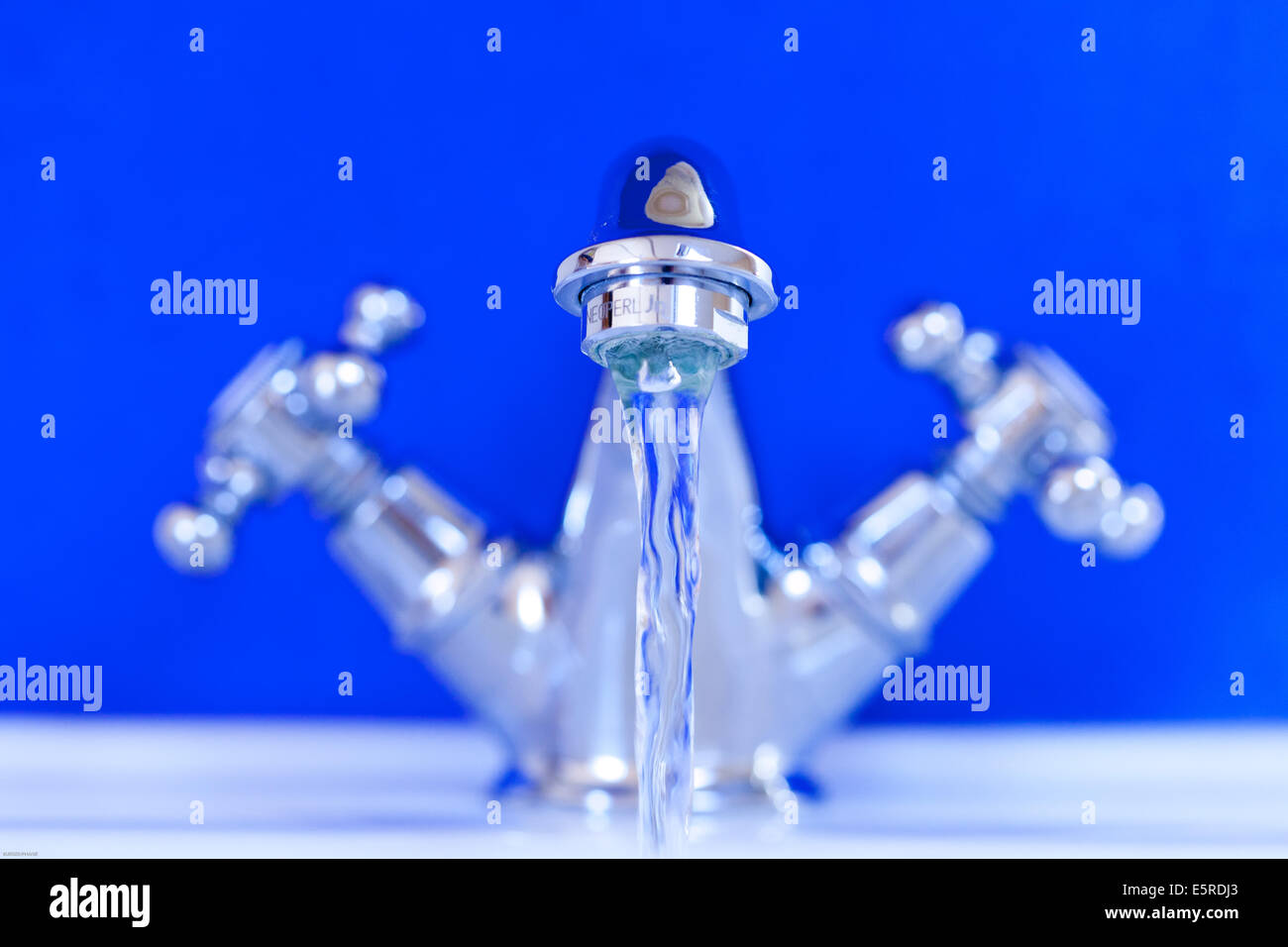 Running a tap Cut Out Stock Images & Pictures Alamy