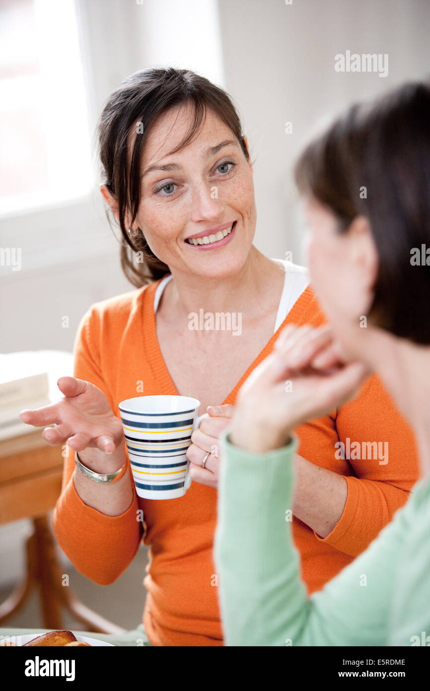 Women drinking a cup of tea Stock Photo Alamy