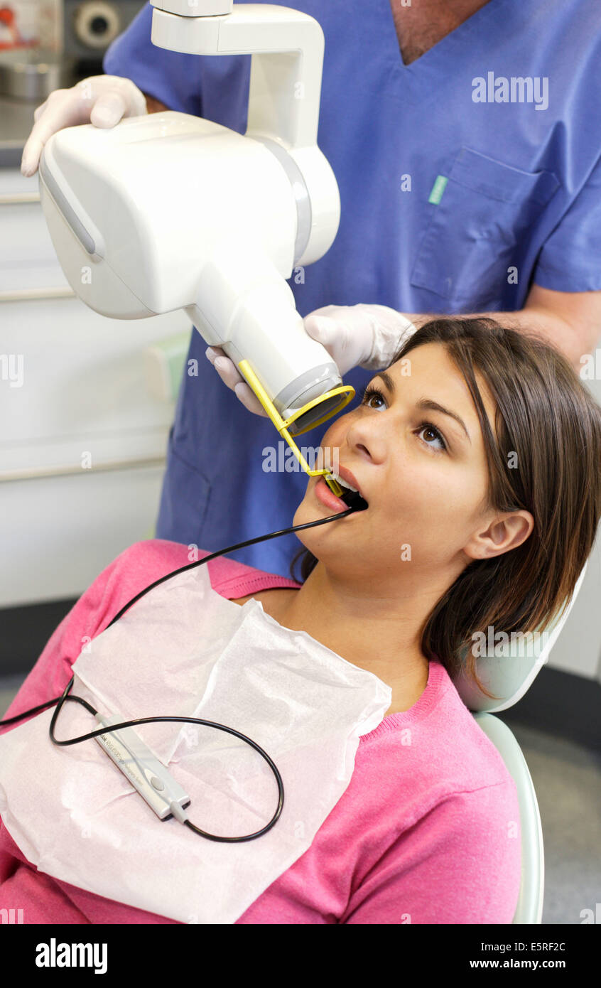 Dentist Taking Dental X-ray Of A Patient Stock Photo - Alamy