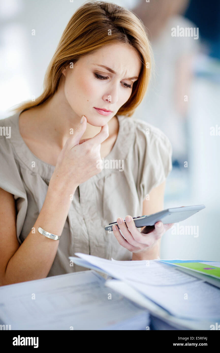 Woman with administrative papers. Stock Photo
