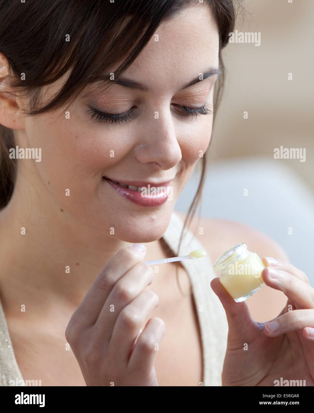 Woman eating royal jelly Stock Photo Alamy
