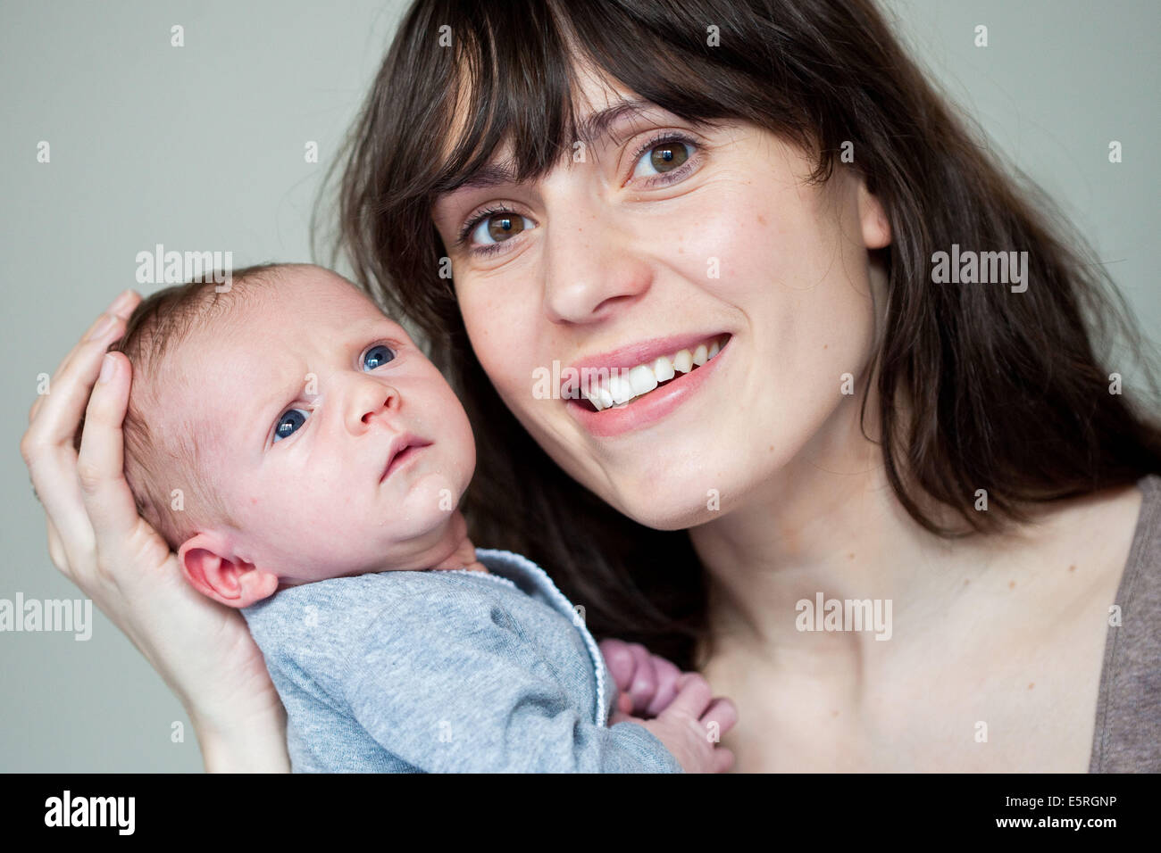 3 week old baby with his mother Stock Photo Alamy