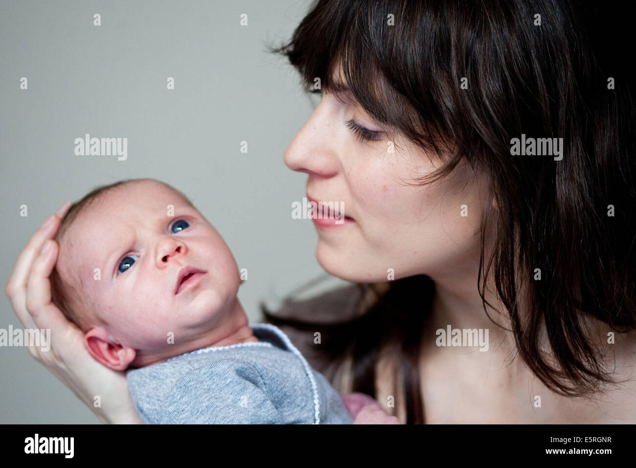 3 week old baby with his mother. Stock Photo
