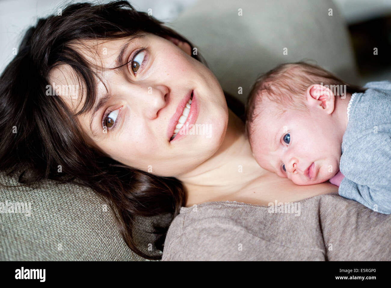 3 week old baby with his mother Stock Photo Alamy