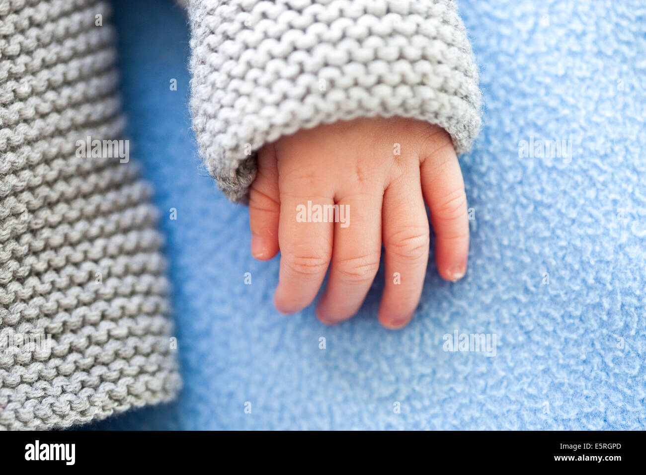 3-week-old baby's hand. Stock Photo