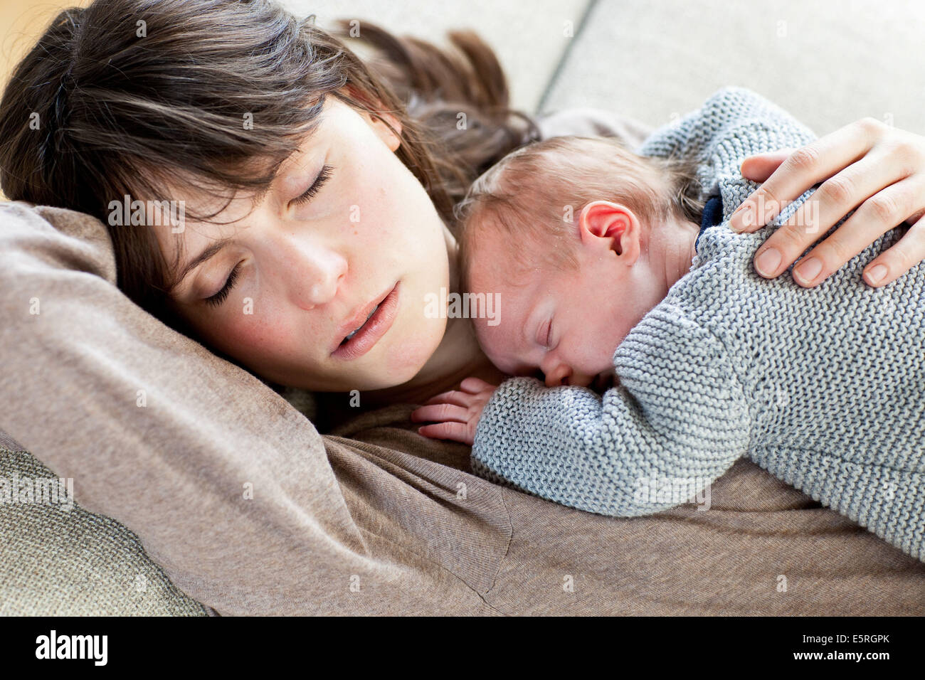 3 week old baby with his mother Stock Photo Alamy