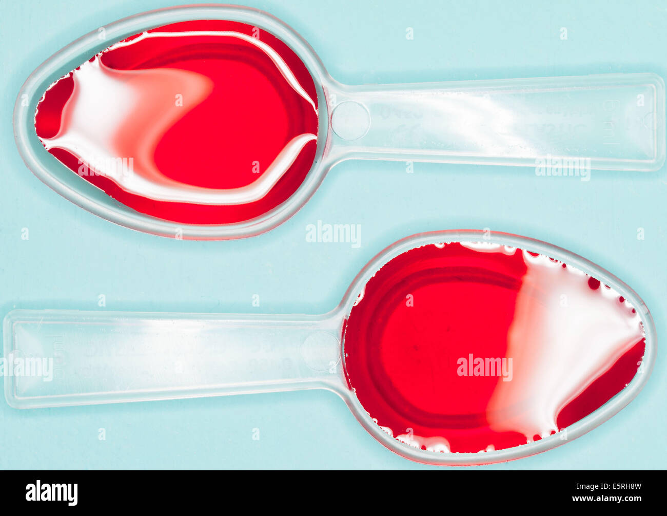 Spoonful of syrup. Stock Photo