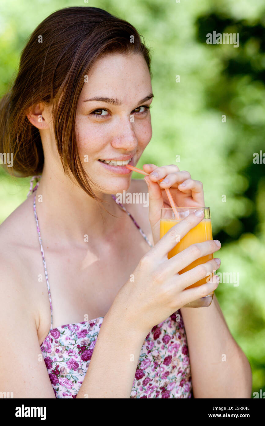 Woman drinking juice Stock Photo Alamy