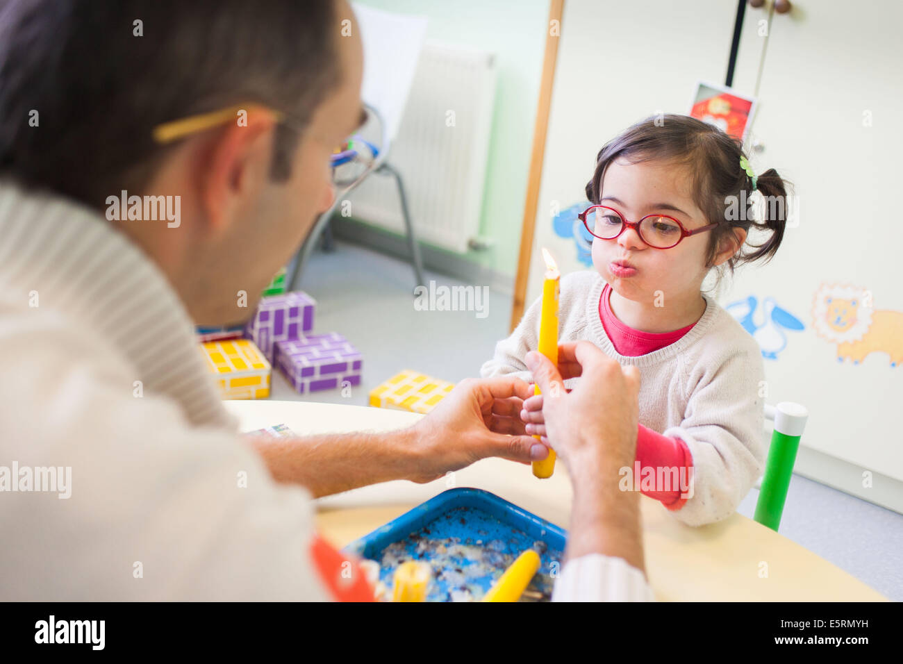 4 Year Old Girl Down S Syndrome During A Session With A Special Education Teacher Stock Photo Alamy 4 Year Old Girl Down S Syndrome During A Session With A Special Education Teacher Stock Photo Alamy