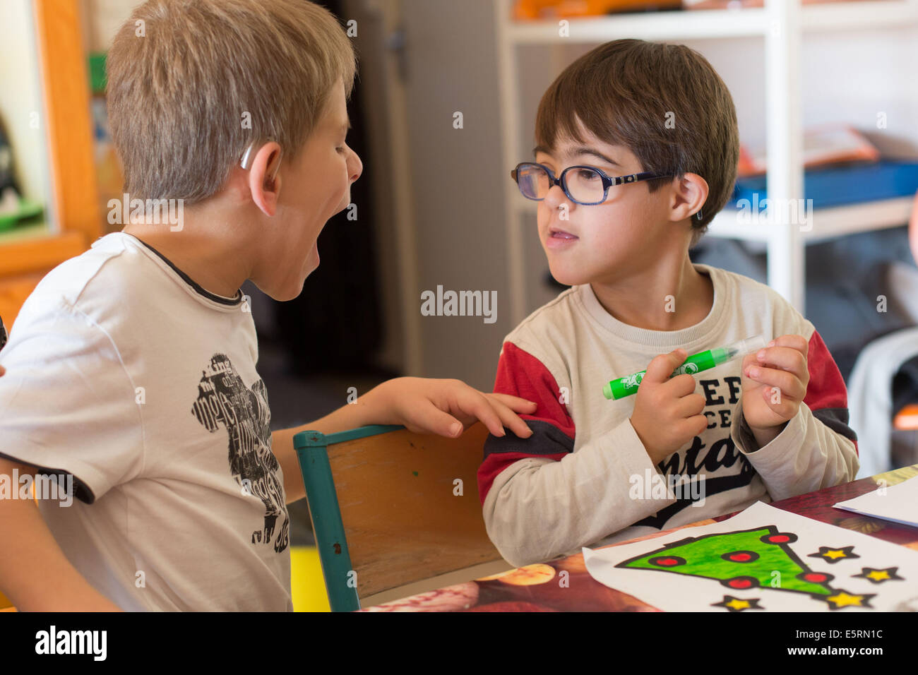 7 years old boys down's syndrome educated in an IME with Special