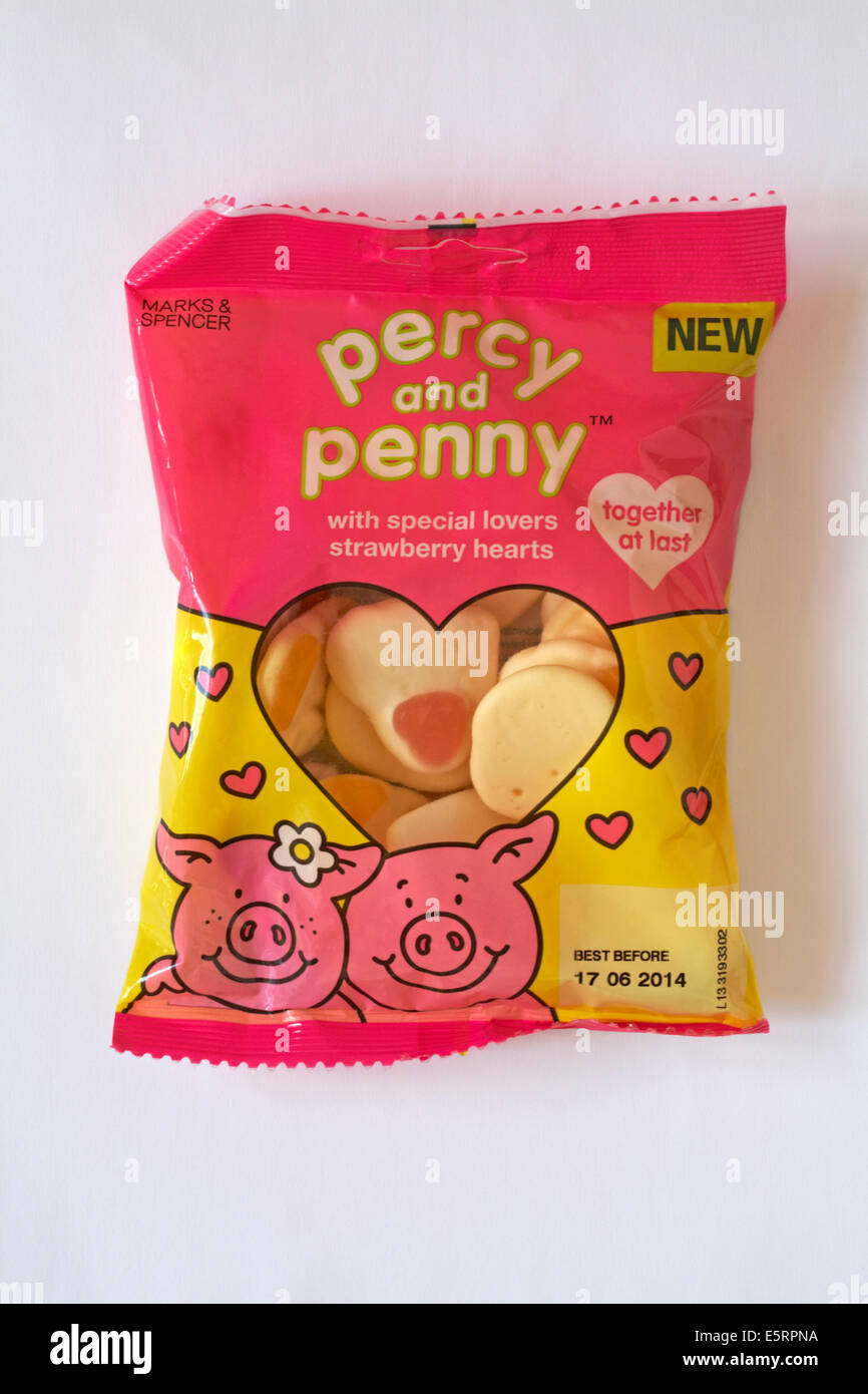 Bag of Marks & Spencer new percy and penny with special lovers strawberry hearts sweets together at last isolated on white background Stock Photo