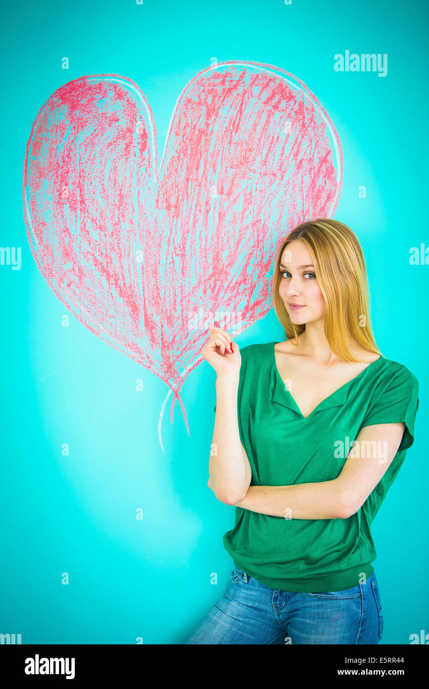 Woman drawing heart Stock Photo - Alamy