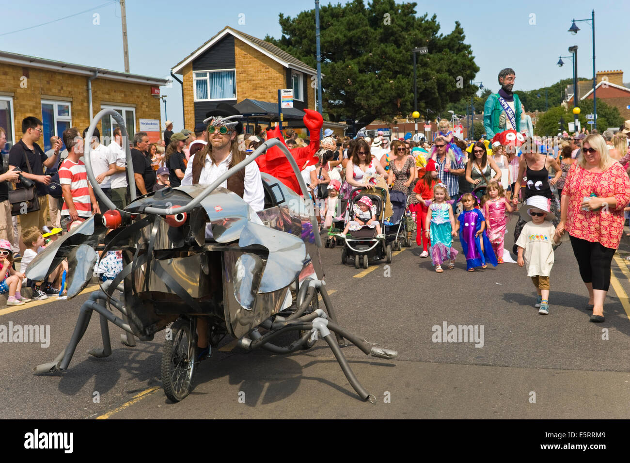 Parade through town centre during Whitstable Oyster Festival Kent