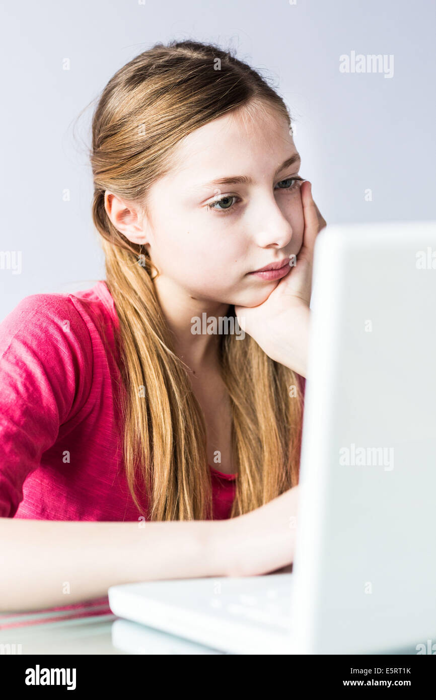 13-year-old teenage girl using laptop computer Stock Photo - Alamy