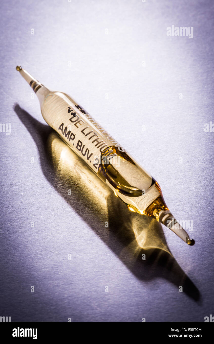 Glass ampoule of lithium (lithium gluconate), used to regulate mood  disorders like irritability or light sleep disorders Stock Photo - Alamy